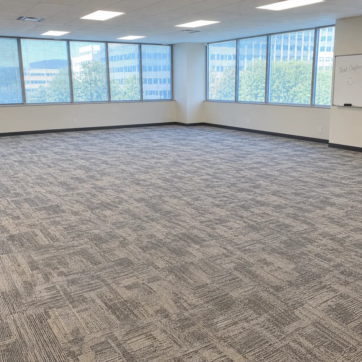 The same Fort Worth office suite emptied back to bare carpet and ready to show